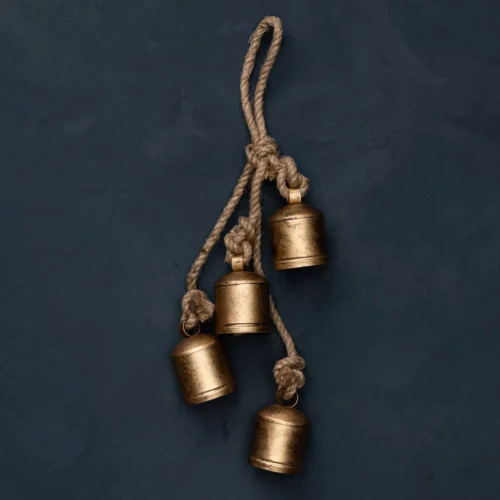 Four gold bells on a rope string.