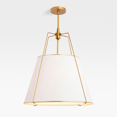 Gold pendant lamp with white shade.