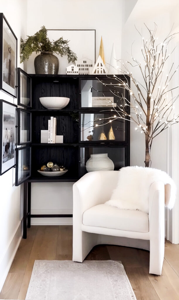 White chair with fur throw in corner.