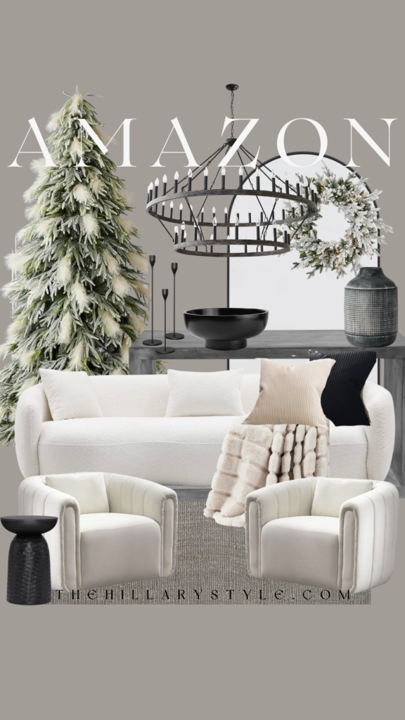 Living room with white furniture and a chandelier.