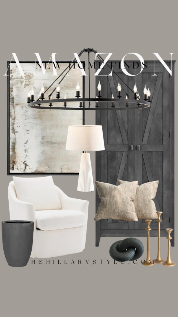 Black chandelier over white armchair and cabinet.