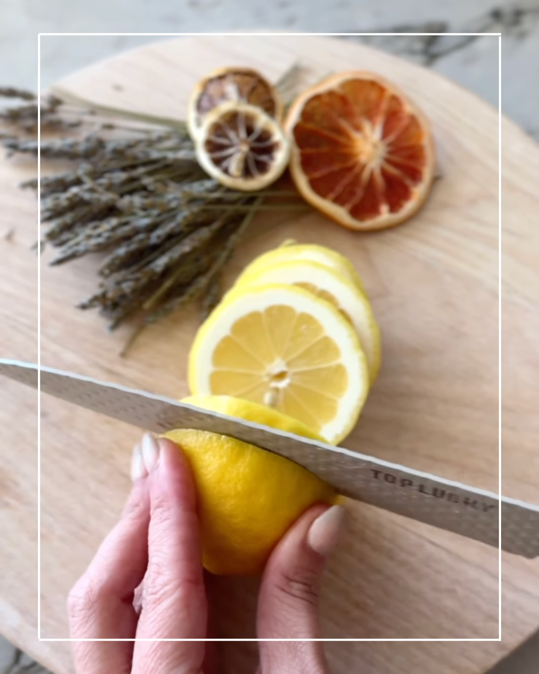 Cutting a lemon on a wooden board.