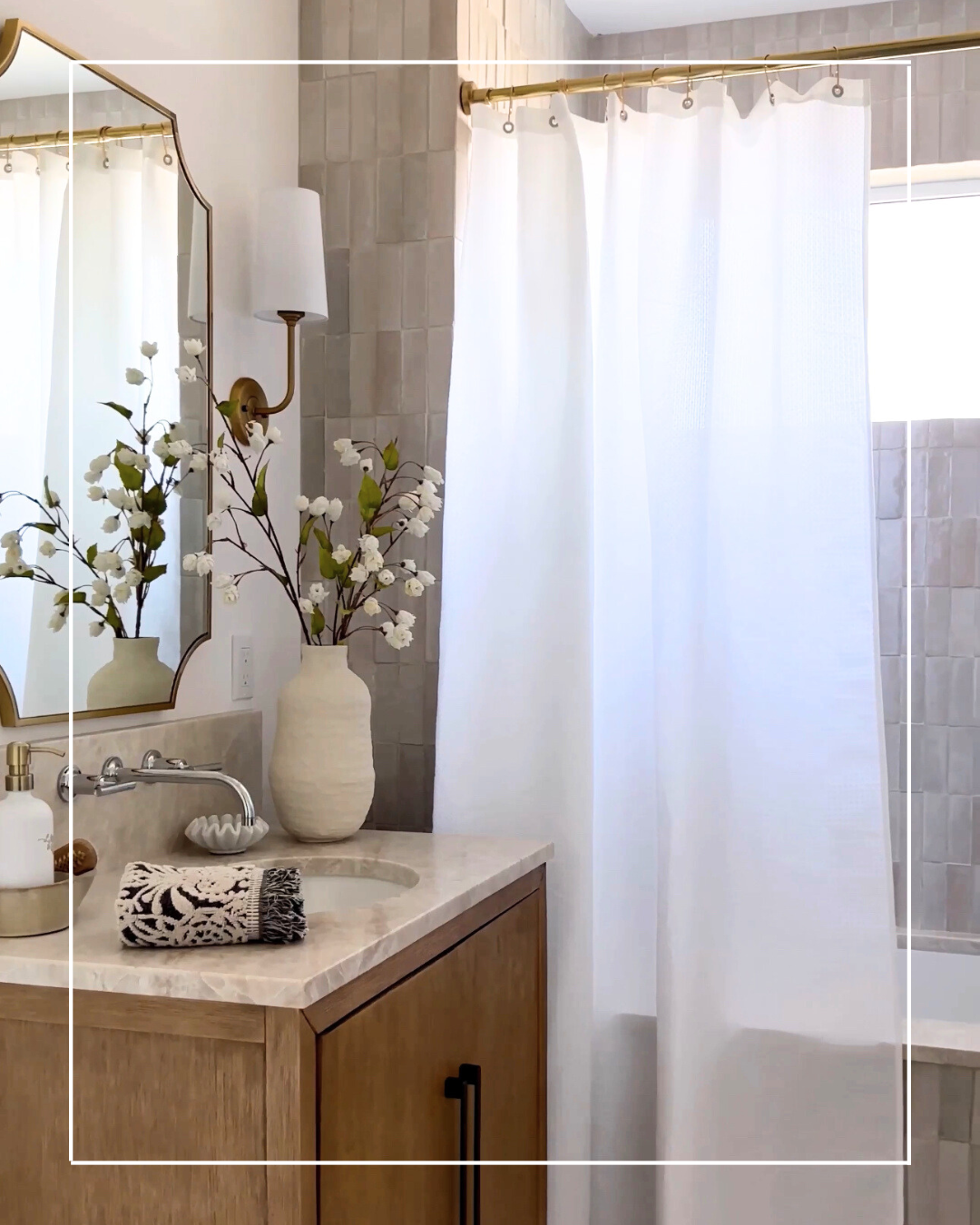 White shower curtain in a modern bathroom.