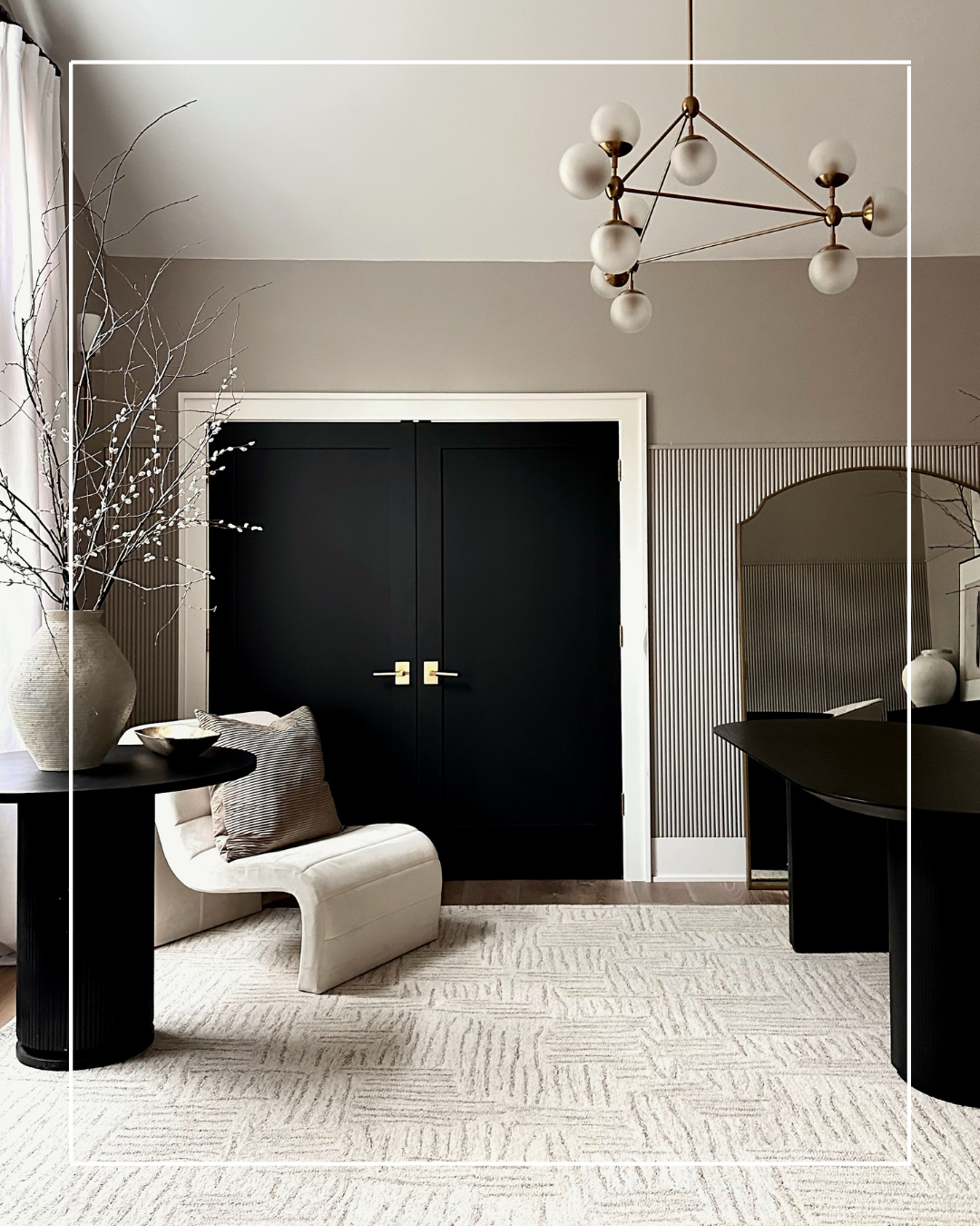 Modern living room with a patterned rug.