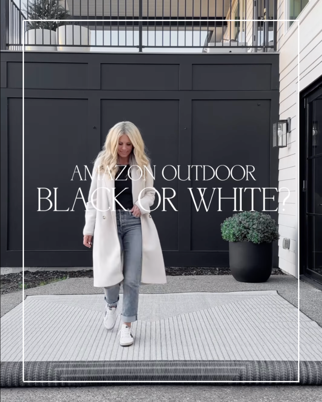 Woman in white coat walks on rug.