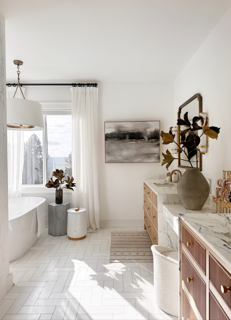 White bathroom with modern design elements.