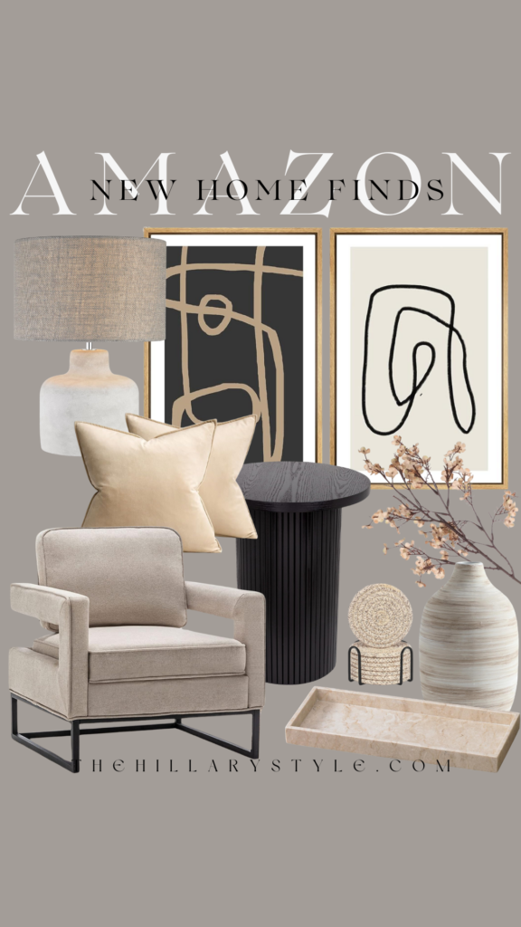 Beige armchair with black side table and art prints.